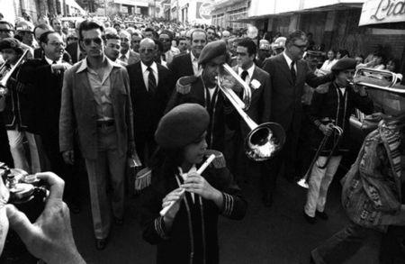 President Joao Figueiredo (3rd L, dark suit and tie), the last military ruler of Brazil who served as president from 1979 to 1985, leads a parade through the streets of Sao Paulo in 1980. REUTERS/Joao Bittar