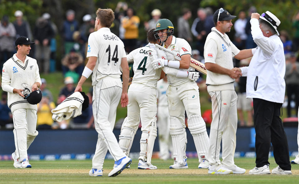 Alex Carey and Pat Cummins, pictured here after Australia's win over New Zealand in the second Test.