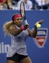 Serena Williams of the U.S. returns a shot to compatriot Taylor Townsend during their women's singles match at the U.S. Open tennis tournament in New York August 26, 2014. REUTERS/Shannon Stapleton