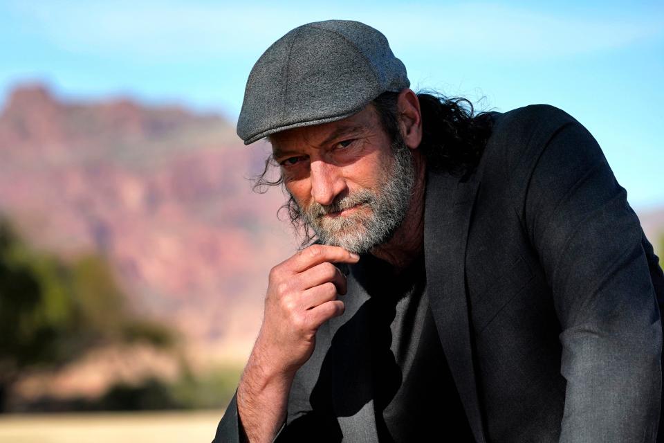 Troy Kotsur, winner of the Oscar for best supporting actor for his role in the film "CODA," poses for a photo at Red Rock Park in Mesa, Ariz., on Jan. 28, 2022.