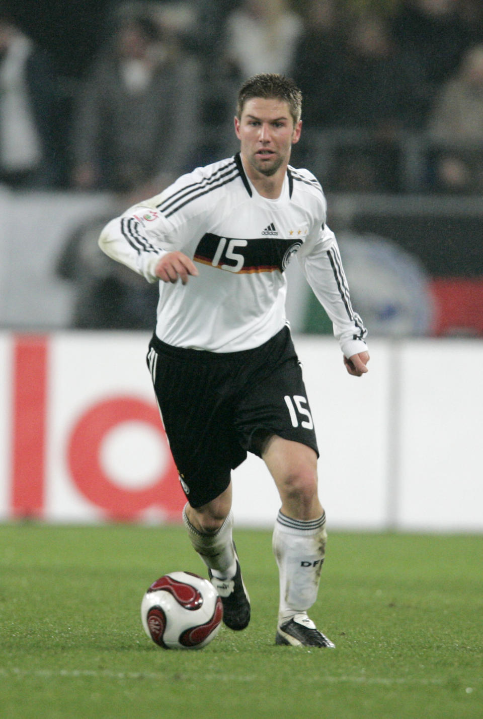 In this picture taken Nov. 17, 2007 Germany's Thomas Hitzlsperger goes with the ball during the Group D Euro 2008 qualifying soccer match between Germany and Cyprus in Hannover, northern Germany. Former Germany midfielder Thomas Hitzlsperger announced he is gay on Wednesday Jan. 8, 2014, becoming likely the most prominent footballer yet to break a long-standing taboo within the sport. Hitzlsperger says in an interview given to Die Zeit newspaper, “I am expressing my sexuality because I want to promote the discussion of homosexuality among professional athletes.” The 31-year-old says he felt now was the right time, four months after retirement following a career in England, Italy and Germany, to approach a subject he feels is “simply ignored.” (AP Photo/Joerg Sarbach)