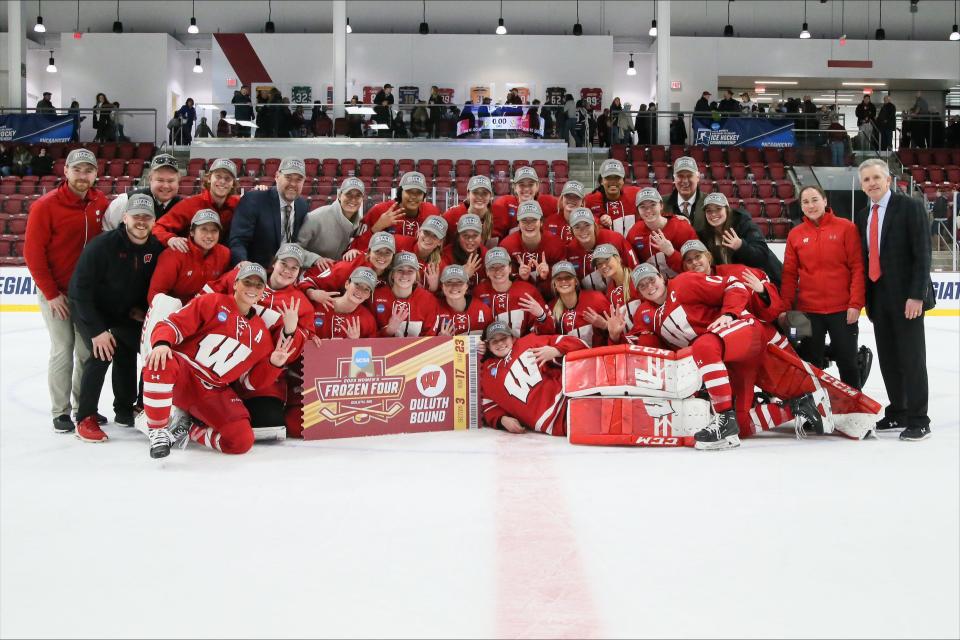 The Wisconsin women's hockey team poses for a team picture after defeating Colgate in a NCAA Tournament regional final Saturday March 11, 2023 at Class of 1965 Arena in Hamilton, N.Y.