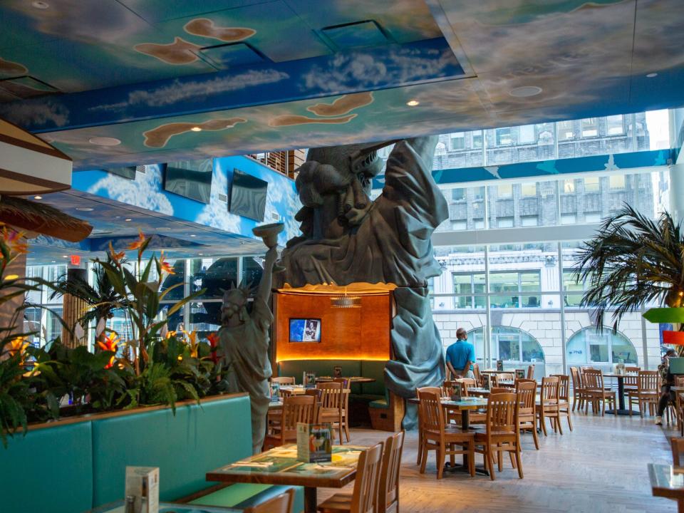 The first floor of the two-floor Margaritaville Restaurant with almost completely empty tables