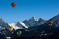 Hot-air ballooning. Photo: Swiss Tourism - The rush: Front-row views of the Alps and the surrounding ski resorts. Season: The International Hot-Air Balloon Festival takes place in January, but you can fly all year-round. CNT tip: Sign up in advance for a flight voucher with Ballon Château-d’Oex. (www.ballonchateaudoex.ch)