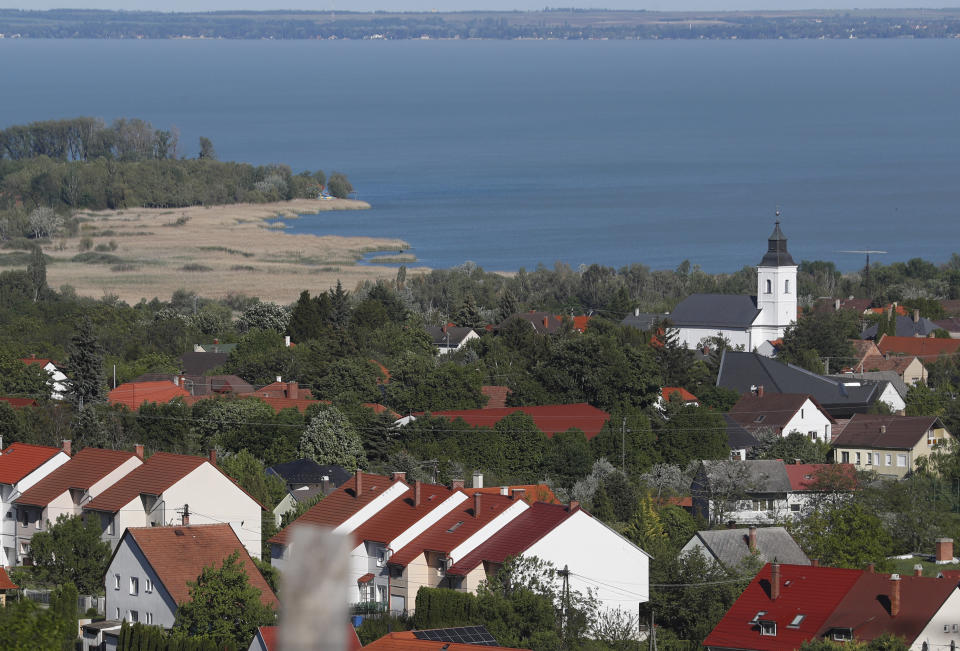 Lake Balaton in Csopak, Hungary on May 18, 2021. Lake Balaton is the largest lake in Central Europe and one of Hungary's most cherished natural treasures. But some worry that the lake's fragile ecosystem and the idyllic atmosphere of the quaint villages dotted along its banks are in danger because of speculative developments. (AP Photo/Laszlo Balogh)