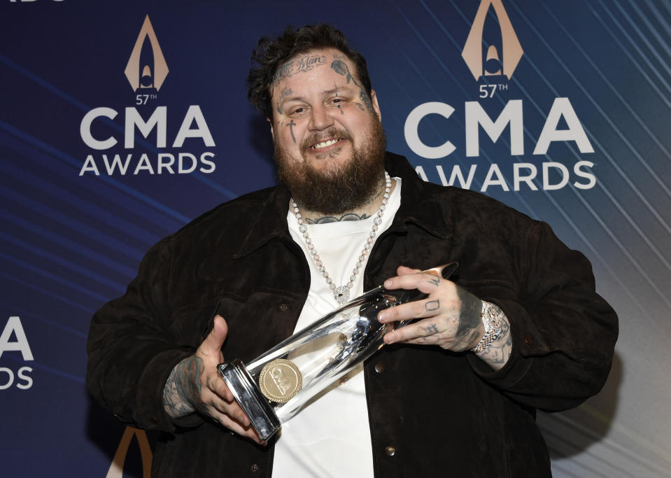 Jelly Roll poses with the award for new artist of the year in the press room at the 57th Annual CMA Awards on Wednesday, Nov. 8, 2023, at the Bridgestone Arena in Nashville, Tenn. (Photo by Evan Agostini/Invision/AP)