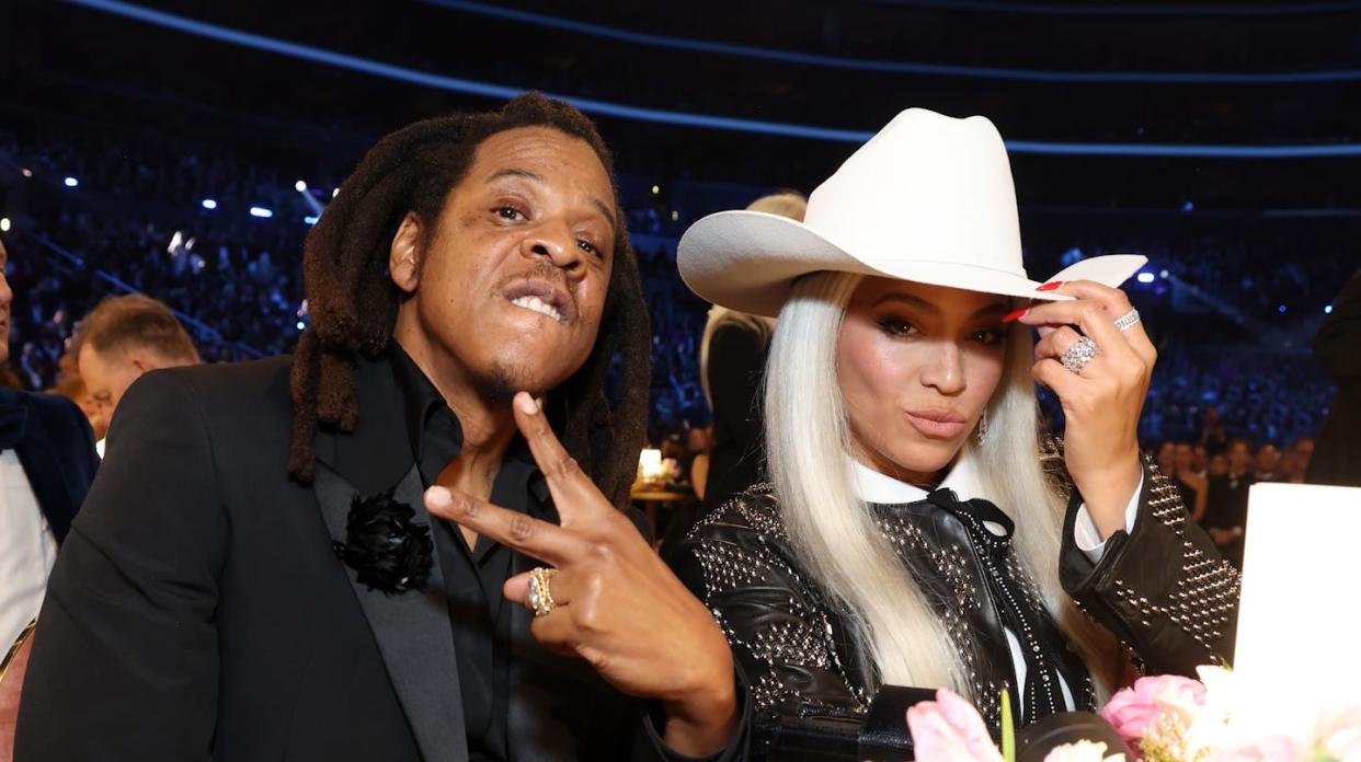 Beyoncé and her husband, Jay-Z, at the 66th Grammy Awards on Feb. 4, 2024, in Los Angeles. <a href="https://www.gettyimages.com/detail/news-photo/beyoncé-and-jay-z-onstage-during-the-66th-grammy-awards-at-news-photo/1986605934?adppopup=true" rel="nofollow noopener" target="_blank" data-ylk="slk:Kevin Mazur/Getty Images;elm:context_link;itc:0;sec:content-canvas" class="link ">Kevin Mazur/Getty Images</a>