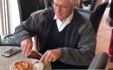 Malcolm Turnbull eating a meat pie using a knife and fork in Australia  - Credit: Instagram story