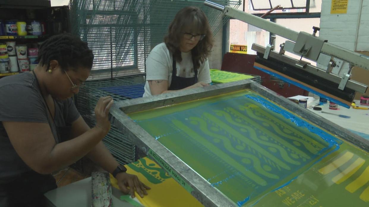 Open Studio, located at 401 Richmond St. W, allows artists to access a variety of printmaking resources. The studio will temporarily shutdown from June 28 until next January due to financial pressures.  (Igor Petrov/CBC - image credit)