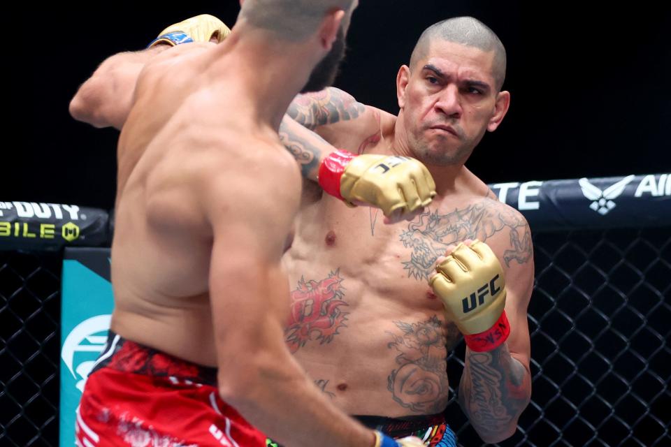 Jun 29, 2024; Las Vegas, Nevada, USA; Alex Pereira (red gloves) fights Jiri Prochazka (blue gloves) during UFC 303 at T-Mobile Arena. Mandatory Credit: Mark J. Rebilas-USA TODAY Sports