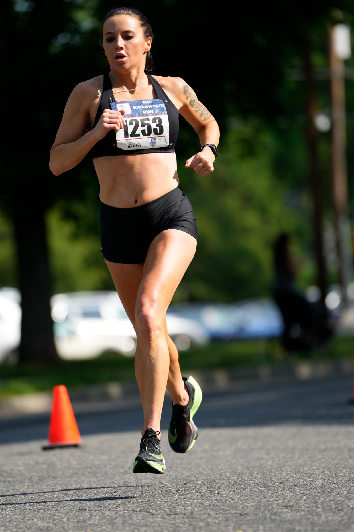 Laura Cummings, is shown on her way to a second place finish, at The Ridgewood Run. Monday, May 29, 2023.