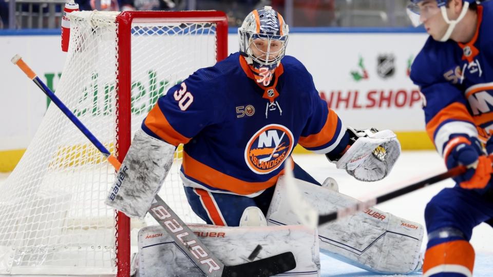 Caption: Nov 23, 2022;  Elmont, New York, USA;  New York Islanders goaltender Ilya Sorokin (30) makes a save against the Edmonton Oilers during the first period at UBS Arena.