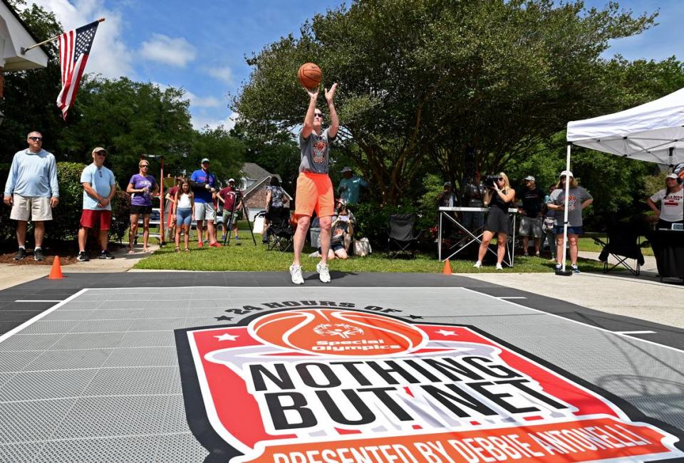 Former North Carolina State women’s basketball player and current college basketball analyst Debbie Antonelli releases a free throw during her 24 Hours of Nothing But Net event to help Special Olympics on Saturday, May 13, 2023. Antonelli shoots and makes 100 free throws every hour for 24 hours.