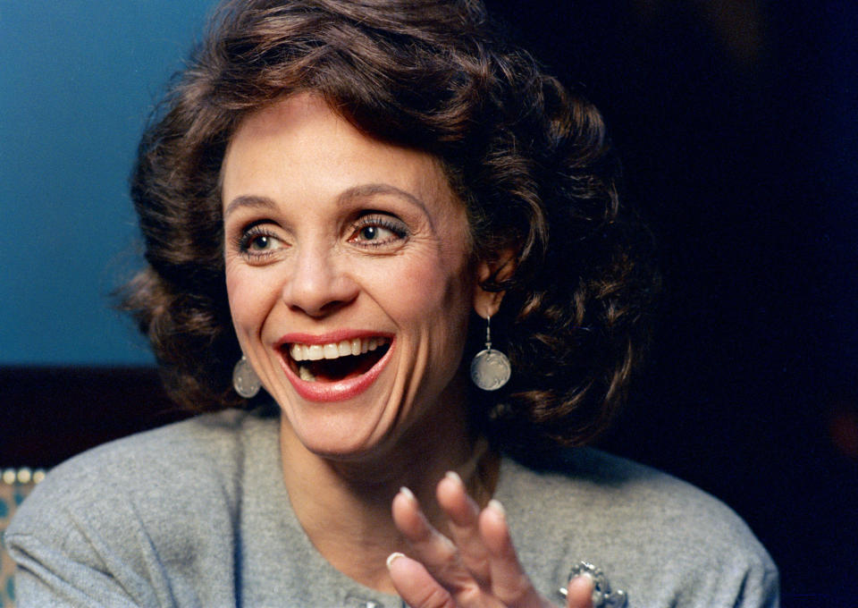 FILE - In this Jan. 1987 file photo, Actress Valerie Harper laughs during an interview in New York. Valerie Harper, who scored guffaws and stole hearts as Rhoda Morgenstern on back-to-back hit sitcoms in the 1970s, has died, Friday, Aug. 30, 2019. She was 80. (AP Photo/Ron Frehm, File)