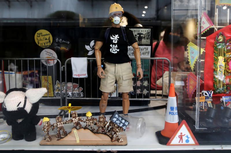 A model of a Hong Kong anti-government protesters is seen at Aegis, a restaurant that offer work opportunities to Hong Kongers seeking asylum in Taipei