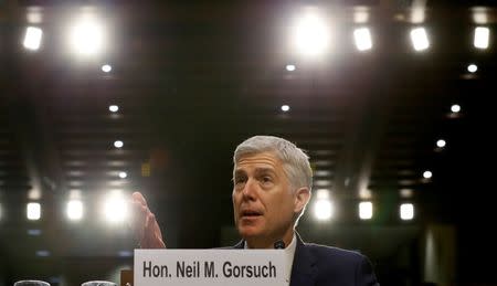 U.S. Supreme Court nominee judge Neil Gorsuch responds to a question as he testifies during the third day of his Senate Judiciary Committee confirmation hearing on Capitol Hill in Washington, U.S., March 22, 2017. REUTERS/Jim Bourg