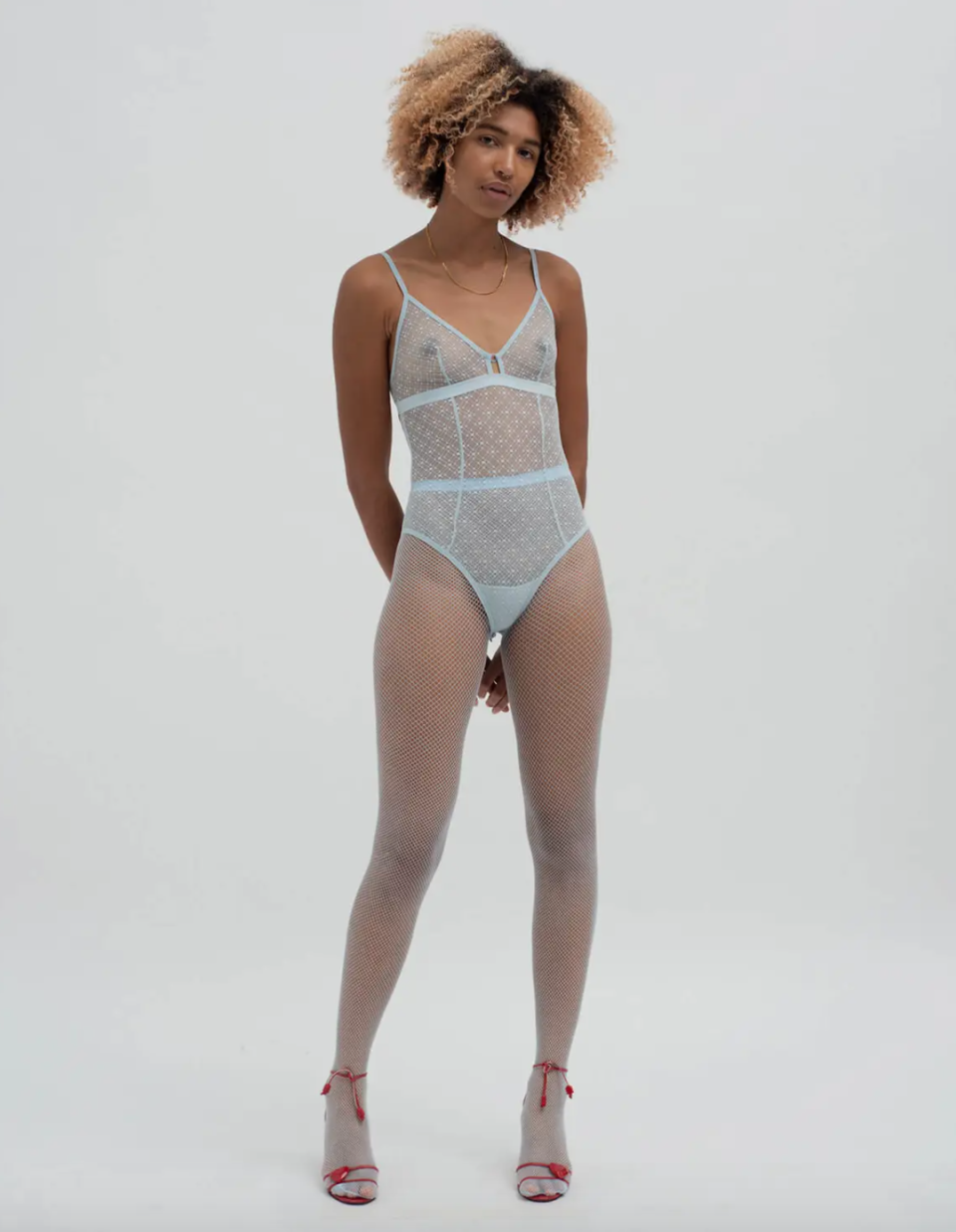 <br><h2>Les Girls Les Boys Diamond Mesh Bodysuit</h2><br>Meet the mesh bodysuit: a sexy sibling of the unitard for those seeking a bolder, underwear-as-outerwear kind of a look. Layer it up or style it like a tank top over another bra — the elasticated and adjustable straps make it easy for this piece to fulfill your fashion fantasies. <br><br><em>Shop <a href="https://www.lesgirlslesboys.com/" rel="nofollow noopener" target="_blank" data-ylk="slk:Les Girls Les Boys" class="link "><strong>Les Girls Les Boys</strong></a></em><br><br><br><br><strong>Les Girls Les Boys</strong> Diamond Mesh Bodysuit, $, available at <a href="https://go.skimresources.com/?id=30283X879131&url=https%3A%2F%2Fwww.lesgirlslesboys.com%2Fdiamond-mesh-bodysuit-spring-blue%2F13366571.html" rel="nofollow noopener" target="_blank" data-ylk="slk:Les Girls Les Boys" class="link ">Les Girls Les Boys</a>