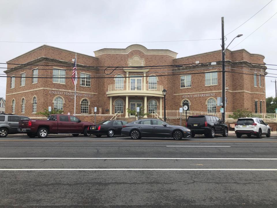 Vehicles from the Ocean County Prosecutor's Office outside Lavallette Police Department and Lavallette Borough Hall, May 19, 2022.