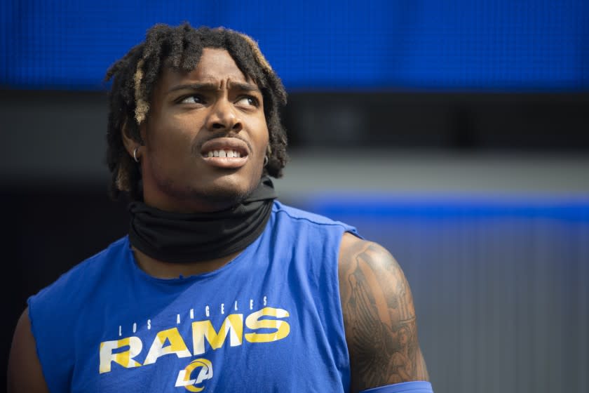 Los Angeles Rams cornerback Jalen Ramsey (5) looks on before an NFL football game against the Arizona Cardinals Sunday, Oct. 3, 2021, in Inglewood, Calif. (AP Photo/Kyusung Gong)