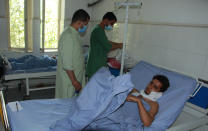 Afghan men are treated at a hospital after being injured in fighting between Taliban and Afghan security forces in Kunduz city, north of Kabul, Afghanistan, Thursday, June 24, 2021. Taliban gains in north Afghanistan, the traditional stronghold of the country's minority ethnic groups who drove the insurgent force from power nearly 20 years ago, has driven a worried government to resurrect militias whose histories have been characterized by chaos and widespread killing. (AP Photo/Samiullah Quraishi)