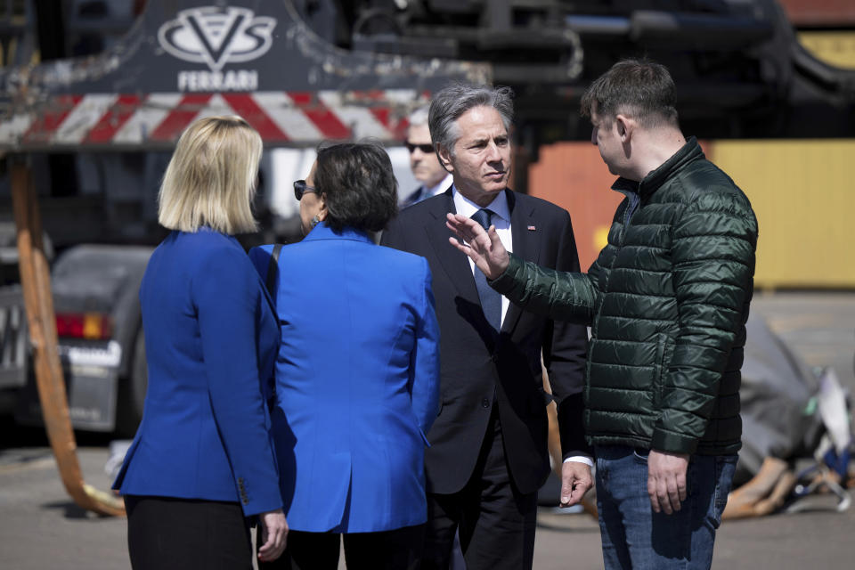 US Secretary of State Antony Blinken, second from right, speaks with officials during his visit to an agricultural logistics and transshipment facility in Vyshneve, Kyiv region, on Wednesday, May 15, 2024. Blinken, who arrived Tuesday on a two-day visit, sought to rally Ukrainians' spirits during the new Russian offensive, assuring them that they are not alone and that billions of dollars in American military aid that is on the way after months of political delays will make a “real difference” on the battlefield. (Brendan Smialowski/Pool Photo via AP)