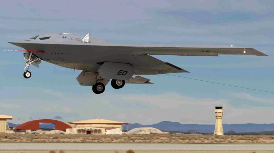 A B-21 Raider conducts a flight test at Edwards Air Force Base, California. <em>Photo courtesy of David Henry, Northrop Grumman</em> A B-21 Raider conducts flight tests, which includes ground testing, taxiing, and flying operations, at Edwards Air Force Base, California, where it continues to make progress toward becoming the backbone of the U.S. Air Force bomber fleet. The B-21 will possess the range, access, and payload to penetrate the most highly-contested threat environments and hold any target around the globe at risk. The B-21 program is on track to deliver aircraft in the mid-2020s to Ellsworth Air Force Base, South Dakota, which will be the first B-21 main operating base and location for the B-21 formal training unit. (Photo courtesy of David Henry, Northrop Grumman)