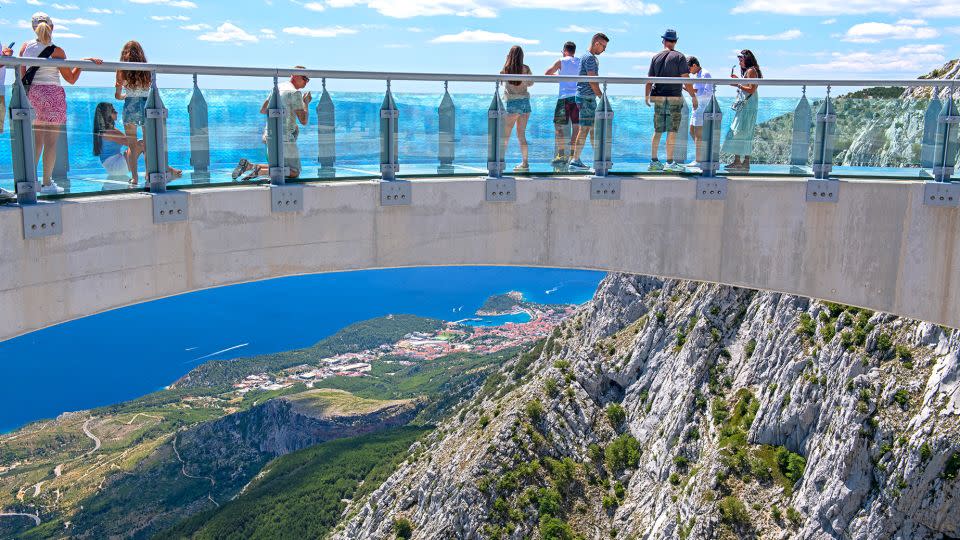 Skywalk Biokovo is a glass-bottomed viewing platform over a national park. - majaiva/iStock Unreleased/Getty Images