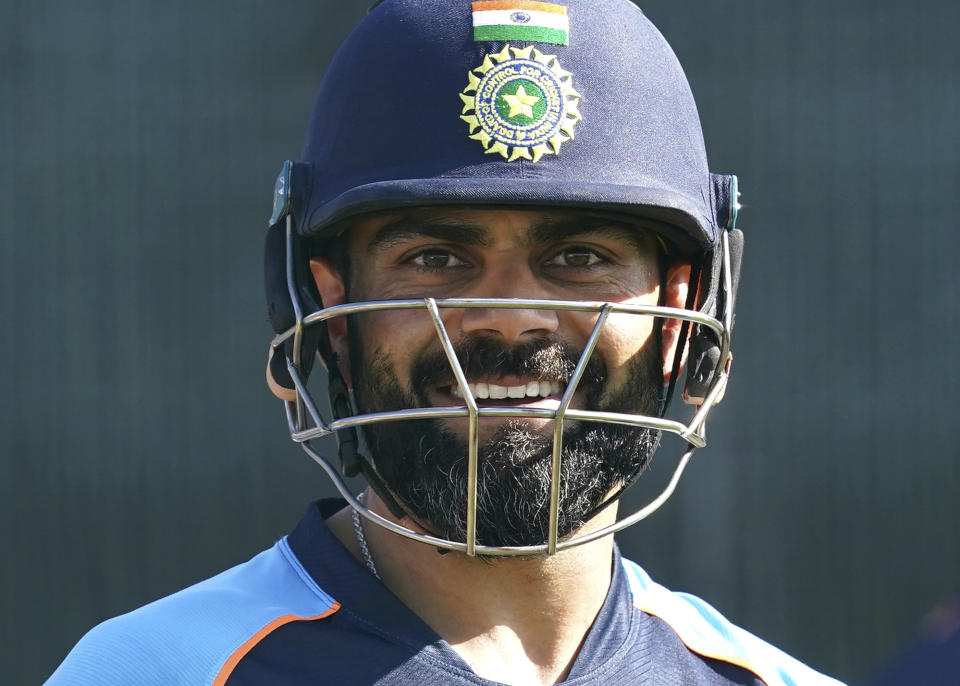 India's Virat Kohli smiles during the nets session at Old Trafford, Manchester, England, Wednesday Sept. 8, 2021 ahead of the fifth cricket test against England. (Martin Rickett/PA via AP)