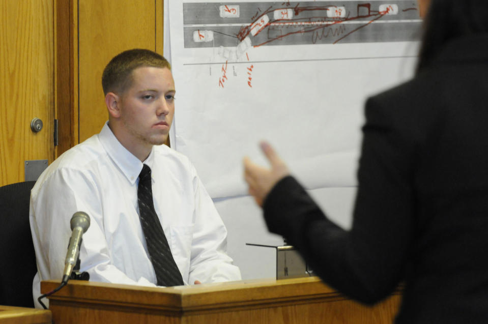Defendant Aaron Deveau, 18, listens to assistant district attorney Ashlee Logan while testifying at Haverhill District Court in Haverhill, Mass. Tuesday, June 5, 2012, where he is on trial on charges of motor vehicle homicide while texting. Authorities say the then-17-year-old Deveau was texting when he crossed the center line of a Haverhill street on Feb. 20, 2011 and crashed into a vehicle driven by 55-year-old Donald Bowley of Danville, N.H., who died 18 days later in the hospital. ((AP Photo/Eagle Tribune, Paul Bilodeau, Pool)