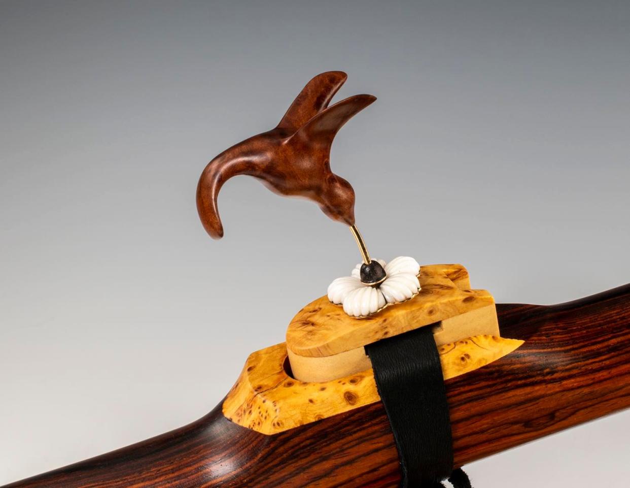 This wooden flute featuring a gold-beaked hummingbird by Bad River Chippewa and Comanche artist Tim Blueflint Ramel will be available at the Autry American Indian Arts Marketplace at the Autry Museum of the American West in Los Angeles on Saturday, June 11 and Sunday, June 12. (Tim Blueflint Ramel)