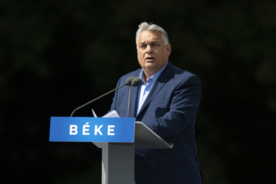 Hungary's Prime Minister Viktor Orbán addresses people as they gather to support him and his party during a "peace march" in Budapest, Hungary, Saturday, June 1, 2024. A crowd of tens of thousands gathered in Hungary’s capital on Saturday in a show of strength behind Orbán a week ahead of European Parliament elections, a contest that he has cast as an existential turning point between peace and a world war. (AP Photo/Denes Erdos)