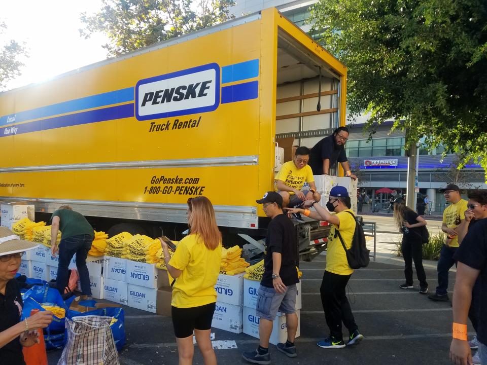 Organizers brought 13,000 pro-Hong Kong T-shirts to Staples Center to pass out prior to the Lakers-Clippers game. (Jeff Eisenberg/Yahoo Sports)