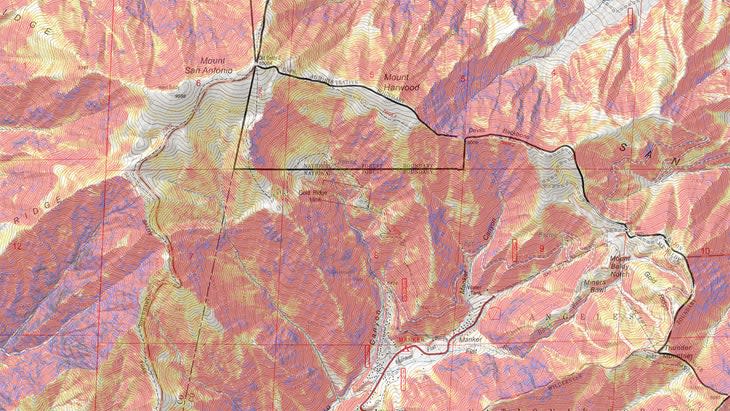 <span class="article__caption">A topographic map of Mount San Antonio, to which I've added slope angle shading. The darker colors are steeper. Note the trailhead at Manker Flats (center), the ski area at Baldy Notch (bottom right), Devil's Backbone ridge (top right), and the summit (top left). (Photo</span>: <a href="https://caltopo.com/map.html" rel="nofollow noopener" target="_blank" data-ylk="slk:CalTopo;elm:context_link;itc:0;sec:content-canvas" class="link ">CalTopo</a>)