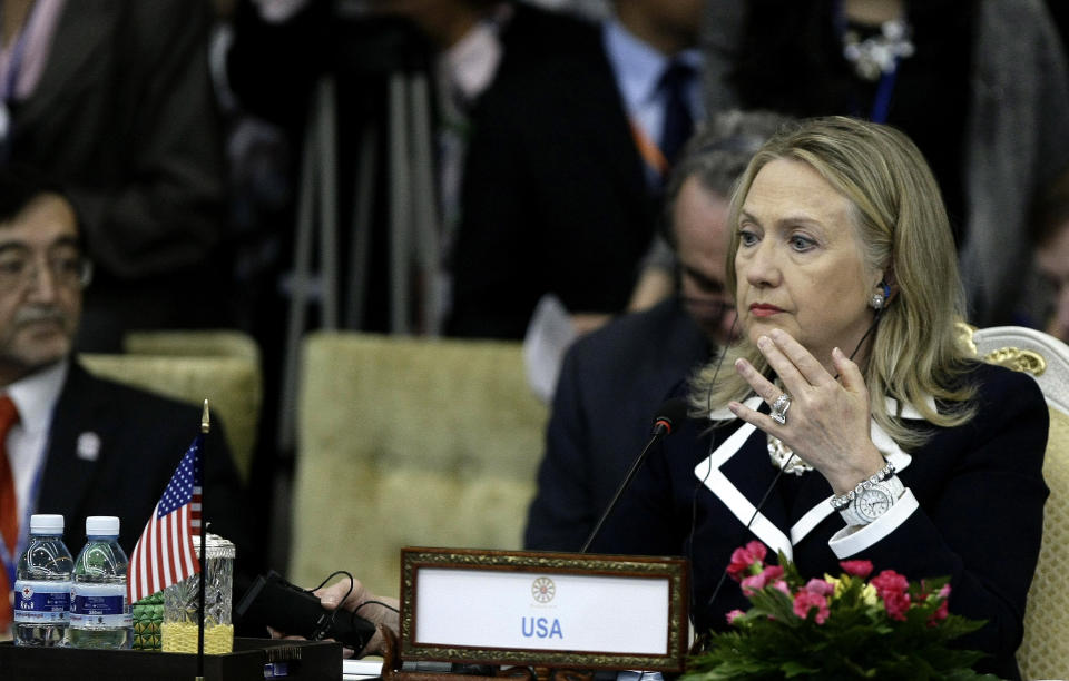 U.S. Secretary of State Hillary Rodham Clinton, right, attends the 2nd East Asia Summit (EAS) Foreign Ministers' Meeting in Phnom Penh, Cambodia, Thursday, July 12, 2012. (AP Photo/Heng Sinith)