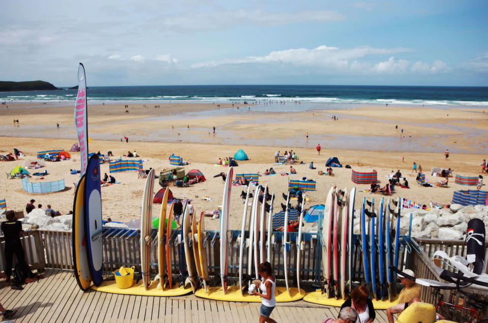 <p>If you’re serious about riding waves, Fistral Beach is the one to head to. It’s in the busy Cornish town of Newquay, and the vast strip of sand is home to surf schools that will coach you from novice to pro. (Graham Stone/Rex)</p>