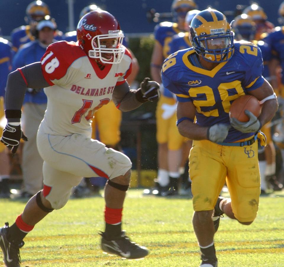 Josh Pope of DSU chases after Omar Cuff of Delaware in their 2007 playoff encounter.
