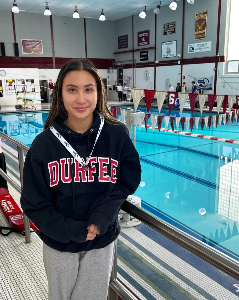 Durfee diver Rachael Silva poses with her eighth place medal during Wednesday's South Sectional championship in Dedham.