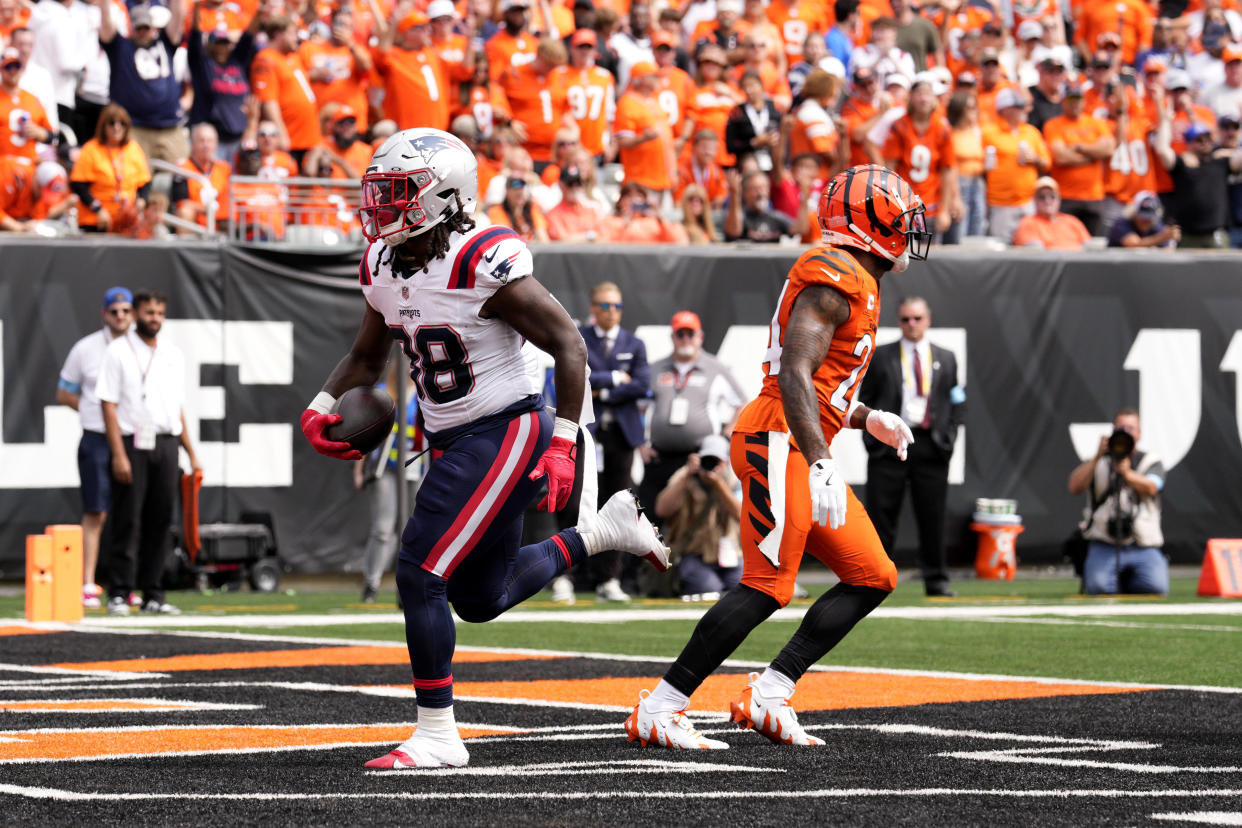 New England Patriots running back Rhamondre Stevenson (38) scores on a 3-yard touchdown run during the first half of an NFL football game against the Cincinnati Bengals, Sunday, Sept. 8, 2024, in Cincinnati. (AP Photo/Jeff Dean)