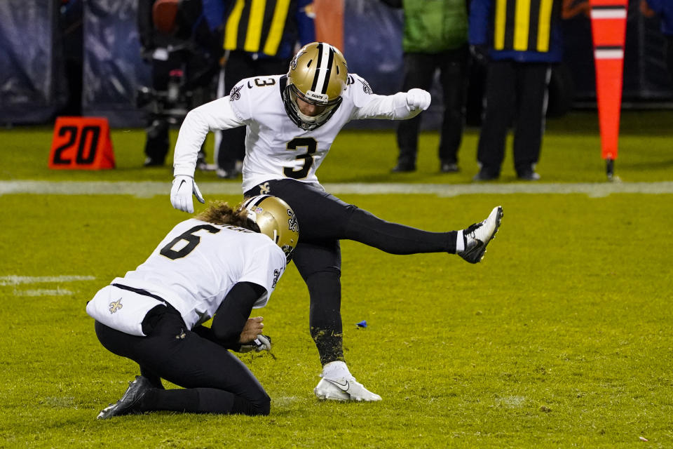 New Orleans Saints kicker Wil Lutz (3) kicks a field goal from the hold of Thomas Morstead in the second half of an NFL football game against the Chicago Bears in Chicago, Sunday, Nov. 1, 2020. (AP Photo/Charles Rex Arbogast)
