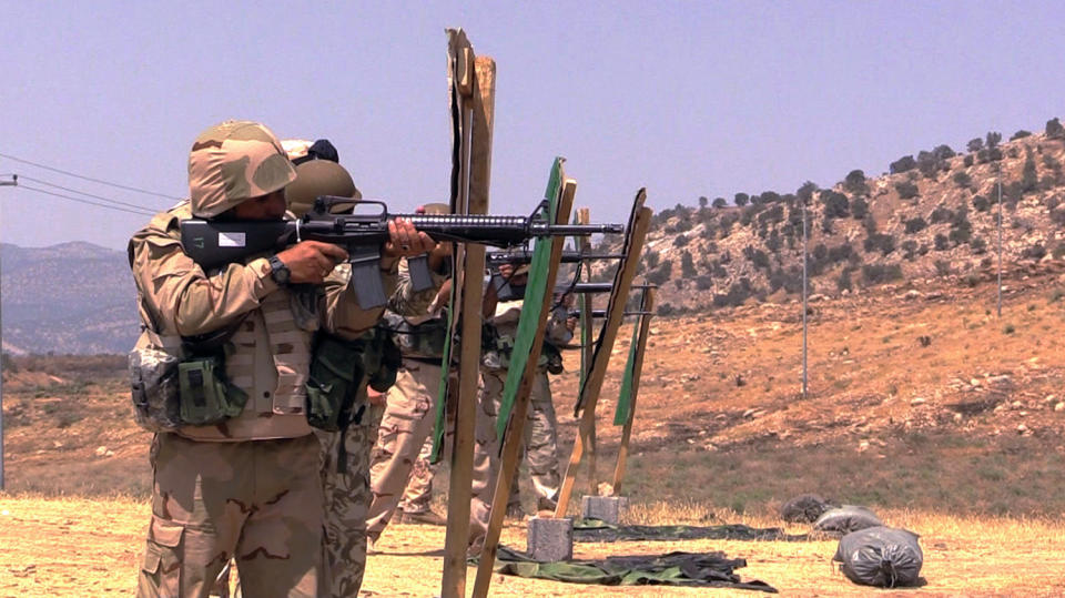 Peshmerga trainees aim for their targets at a coalition training base. (Photo: Ash Gallagher/Yahoo News)