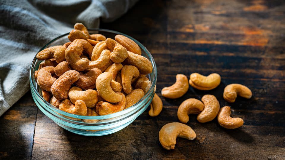 Studies have shown that eating cashews can lower levels of harmful <a href="https://medlineplus.gov/ldlthebadcholesterol.html">LDL cholesterol</a>. - fcafotodigital/E+/Getty Images