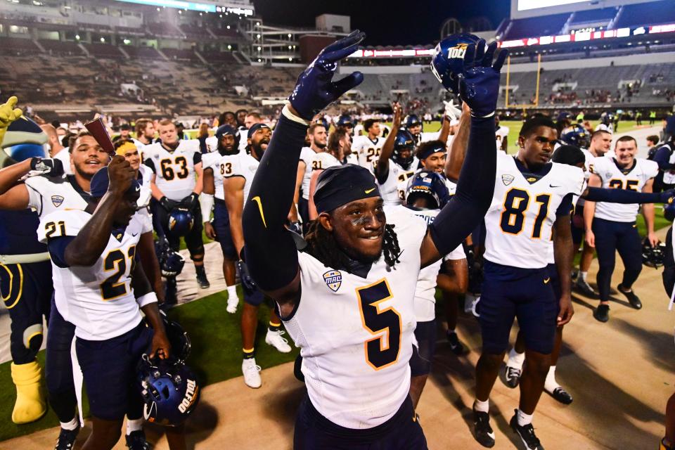 Sep 14, 2024; Starkville, Mississippi, USA; Toledo Rockets players react after defeating the Mississippi State Bulldogs at Davis Wade Stadium at Scott Field. Mandatory Credit: Matt Bush-Imagn Images