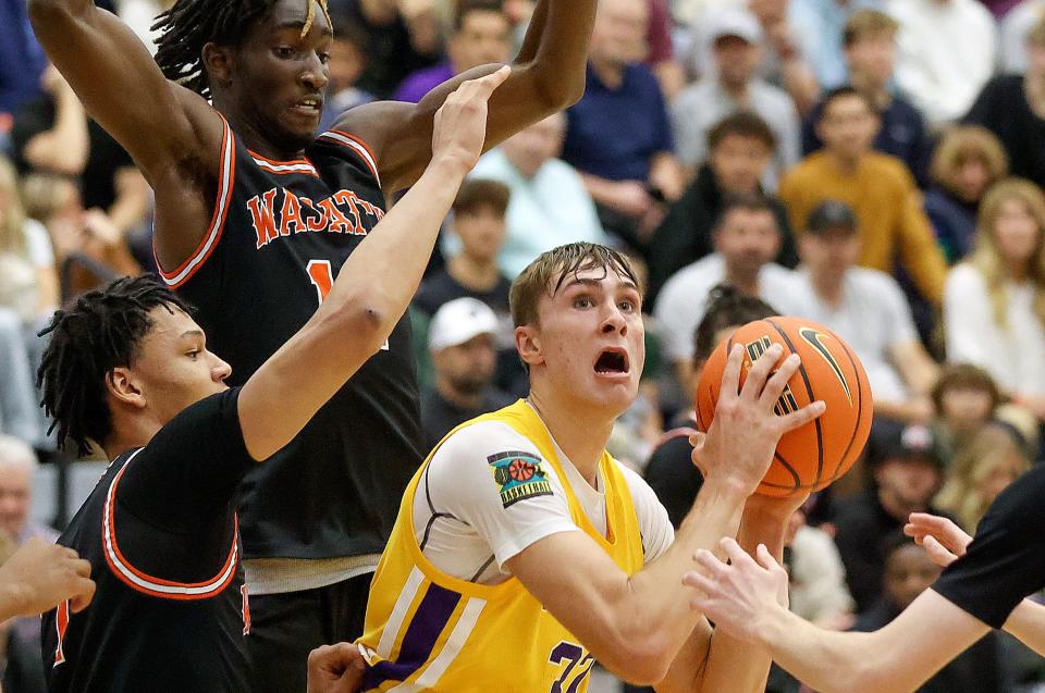 Montverde Academy’s Cooper Flagg looks to shoot as Wasatch Academy’s Isiah Harwell, Chris Nwuli and Fischer Brown guard him during a National Hoopfest Utah Tournament game at Pleasant Grove High School in Pleasant Grove on Monday, Nov. 20, 2023. Montverde won 88-53. | Kristin Murphy, Deseret News
