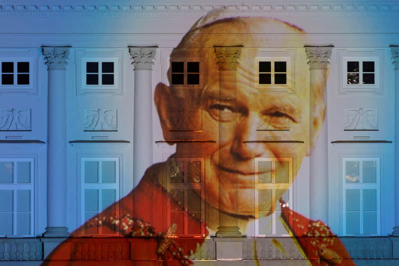FILE PHOTO: Picture of Pope John Paul II displayed on the Presidential Palace in Poland