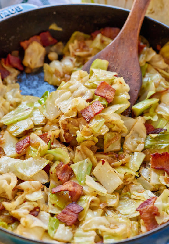 <p>Black People's Recipes</p><p>This southern cabbage recipe is made with bacon and bacon fat to add flavor and texture to the dish. It’s quick, coming together in less than 30 minutes, and is perfect to go along with your favorite entree.</p><p><strong>Get the recipe: <a href="https://blackpeoplesrecipes.com/southern-fried-cabbage-with-bacon/" rel="nofollow noopener" target="_blank" data-ylk="slk:Southern Fried Cabbage with Bacon;elm:context_link;itc:0;sec:content-canvas" class="link rapid-noclick-resp">Southern Fried Cabbage with Bacon</a></strong></p>