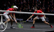 Tennis - Laver Cup - 2nd Day - Prague, Czech Republic - September 23, 2017 - Jack Sock and Sam Querrey of team World in action against Rafael Nadal and Roger Federer of team Europe. REUTERS/David W Cerny