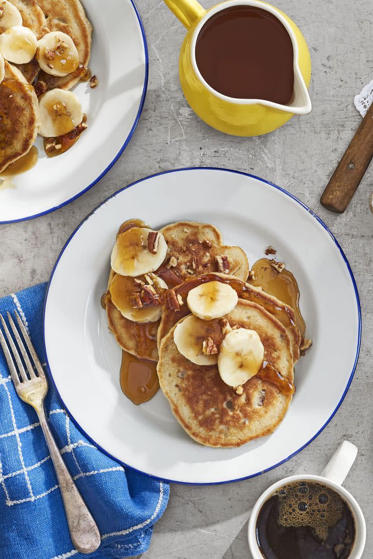 <p>Make sure you give Mom a pitcher of maple syrup to go with these banana pecan pancakes. </p><p><em><a href="https://www.countryliving.com/food-drinks/recipes/a41653/banana-bread-flapjacks-recipe/" rel="nofollow noopener" target="_blank" data-ylk="slk:Get the recipe from Country Living »;elm:context_link;itc:0;sec:content-canvas" class="link ">Get the recipe from Country Living »</a></em></p>