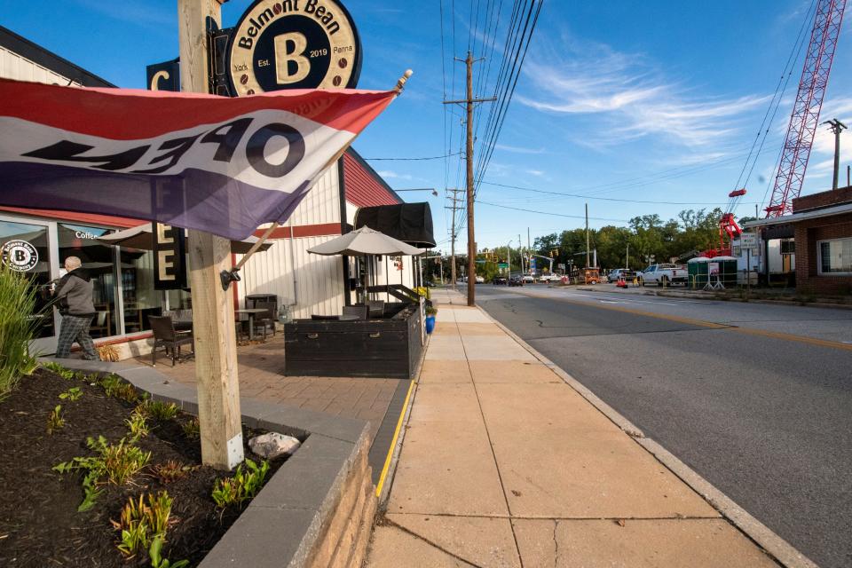 Elise Lanteigne-Marrow, manager of the Belmont Bean Co. coffee shop said that business was "slower than normal, but our regulars are showing up," during the first day of closure. The business is beside the eastern side of the construction site.