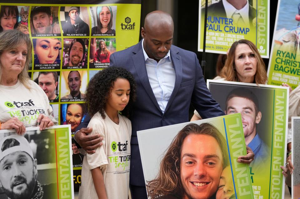 Lawrence Turner and his 9-year-old daughter, Aven, attend Friday's news conference after Juan Ignacio Soria Gamez's sentencing.