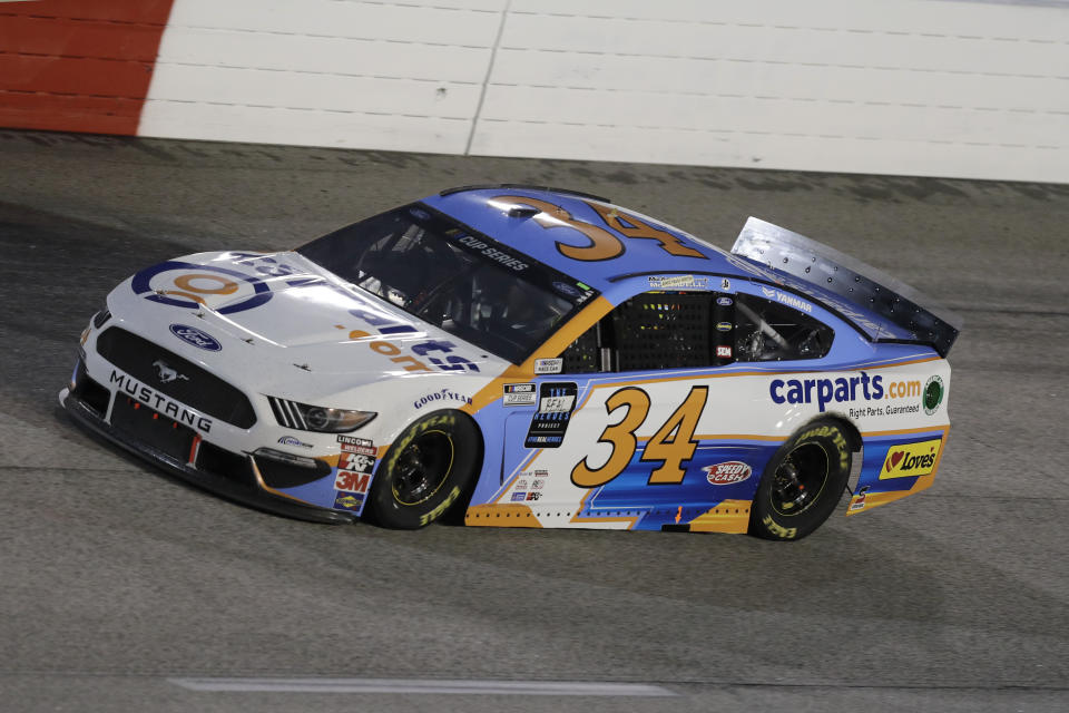 Michael McDowell (34) drives during the NASCAR Cup Series auto race Wednesday, May 20, 2020, in Darlington, S.C. (AP Photo/Brynn Anderson)